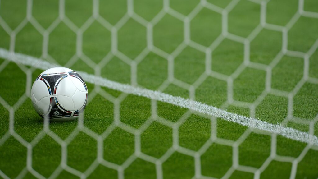 A ball is pictured on the pitch during a
